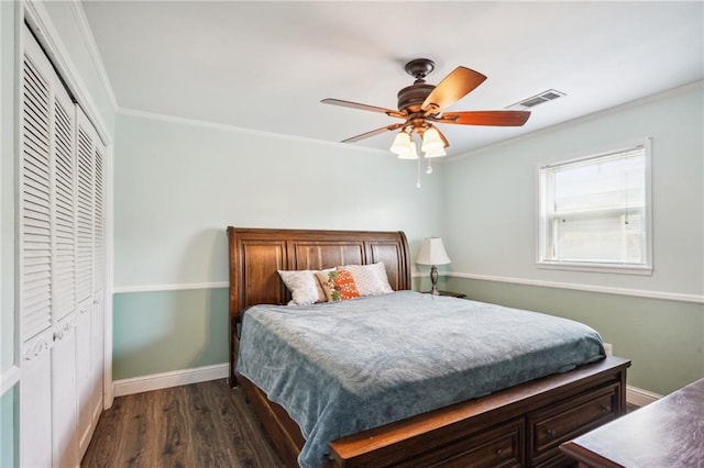 bedroom featuring ornamental molding, ceiling fan, and dark hardwood / wood-style floors