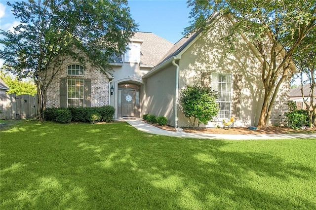 view of front of house with a front yard