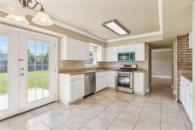 kitchen featuring appliances with stainless steel finishes, sink, and plenty of natural light