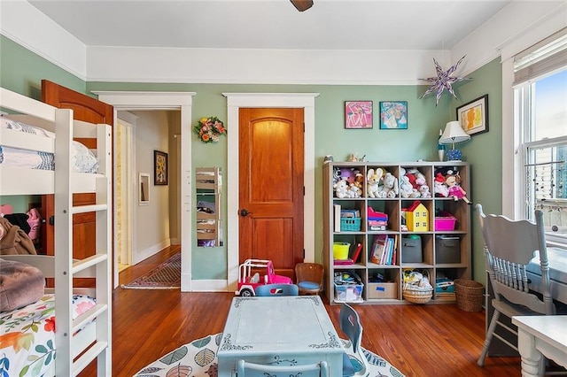 recreation room featuring dark wood-type flooring