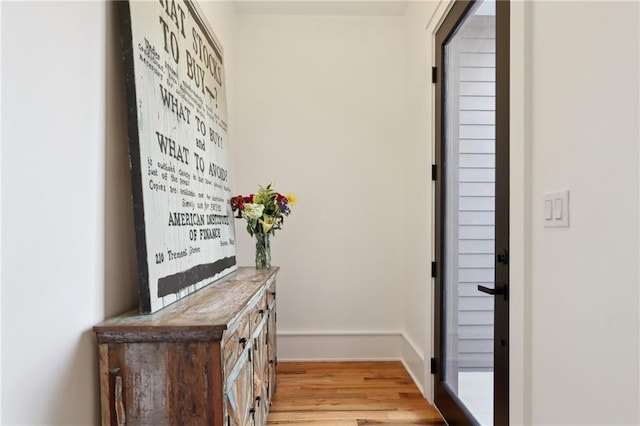 doorway to outside featuring light hardwood / wood-style flooring