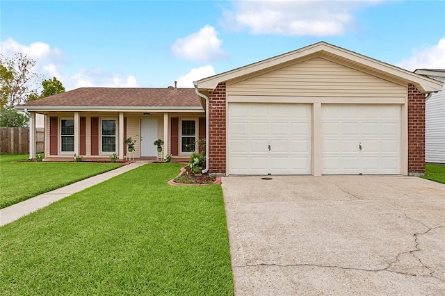 single story home featuring a garage and a front lawn