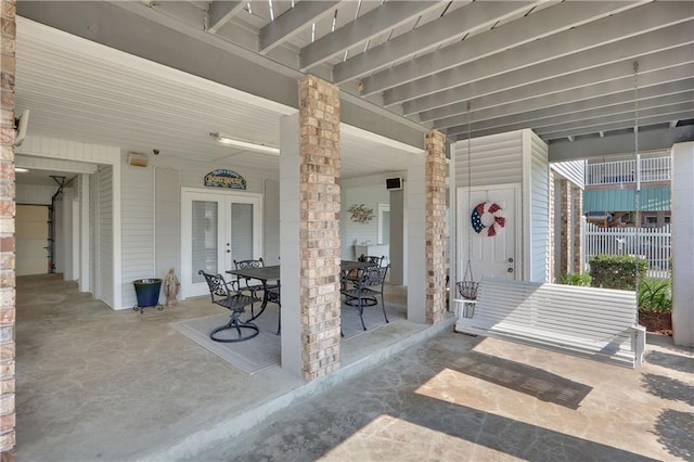 view of patio featuring french doors