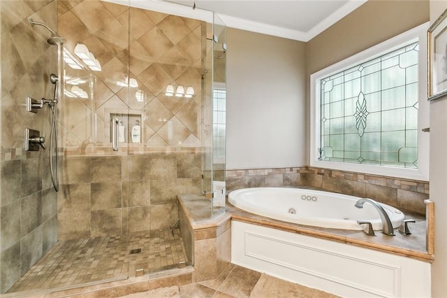 bathroom with crown molding, separate shower and tub, and a wealth of natural light