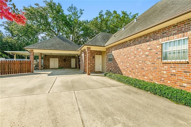 exterior space featuring a carport