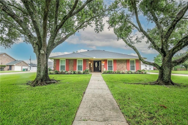 ranch-style house with a front yard