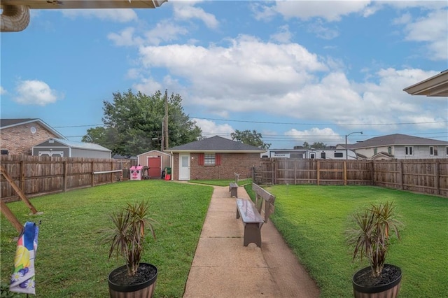 view of yard featuring a storage unit