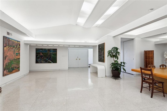 interior space featuring lofted ceiling