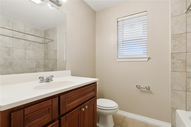 full bathroom with tile patterned flooring, vanity, toilet, and tiled shower / bath combo