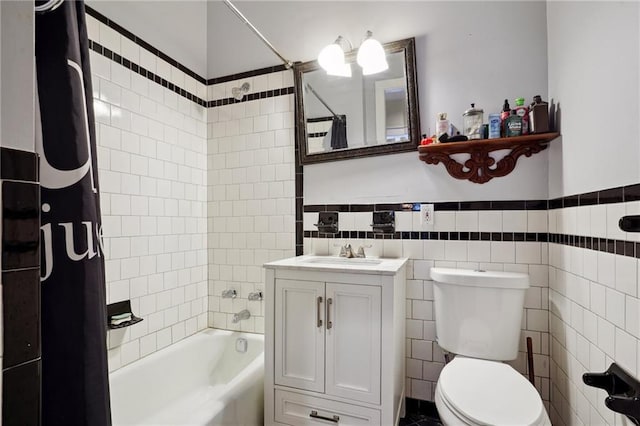 full bathroom with toilet, shower / bath combination with curtain, vanity, and tile walls