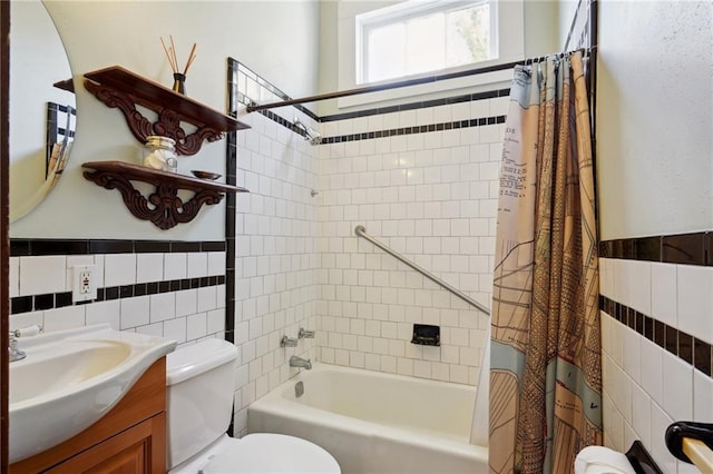 full bathroom featuring vanity, toilet, shower / bath combination with curtain, and tile walls