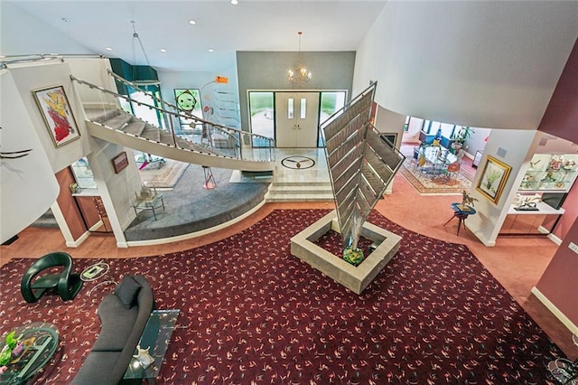 staircase featuring recessed lighting, baseboards, carpet floors, and a chandelier