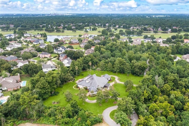 aerial view with a residential view and a water view