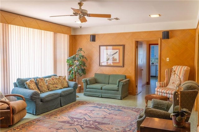 living room featuring ceiling fan