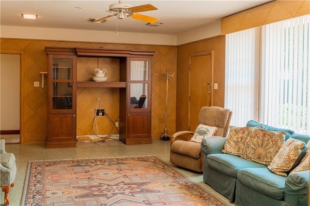 living room featuring ceiling fan