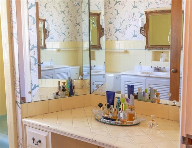 kitchen with sink and tile counters