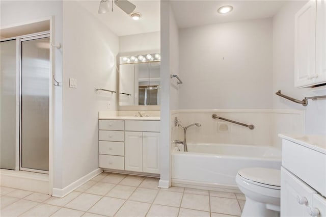 full bathroom featuring ceiling fan, vanity, shower with separate bathtub, and toilet