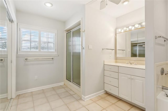 bathroom with vanity, ceiling fan, tile patterned floors, and a shower with shower door