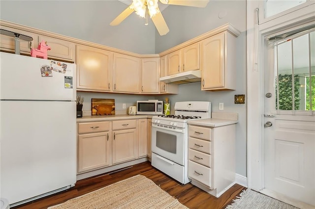 kitchen featuring under cabinet range hood, white appliances, light countertops, ceiling fan, and dark wood-style flooring