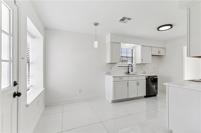 kitchen with white cabinetry, sink, decorative light fixtures, and black dishwasher