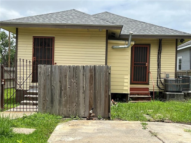 bungalow with central air condition unit