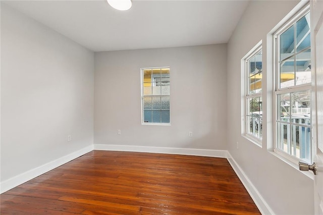 spare room featuring hardwood / wood-style flooring