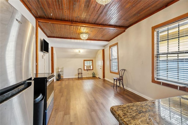 interior space with beam ceiling, wood ceiling, and wood-type flooring