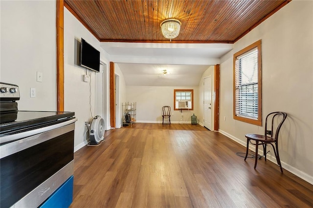 kitchen with wood-type flooring, wooden ceiling, and stainless steel range with electric cooktop