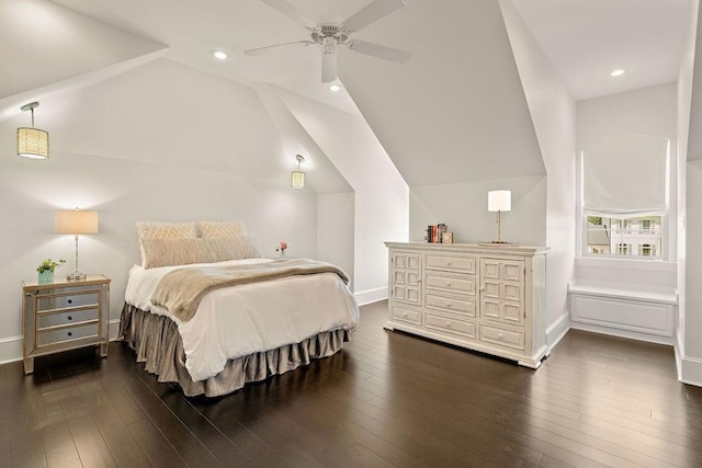 bedroom featuring ceiling fan, dark wood-type flooring, and lofted ceiling