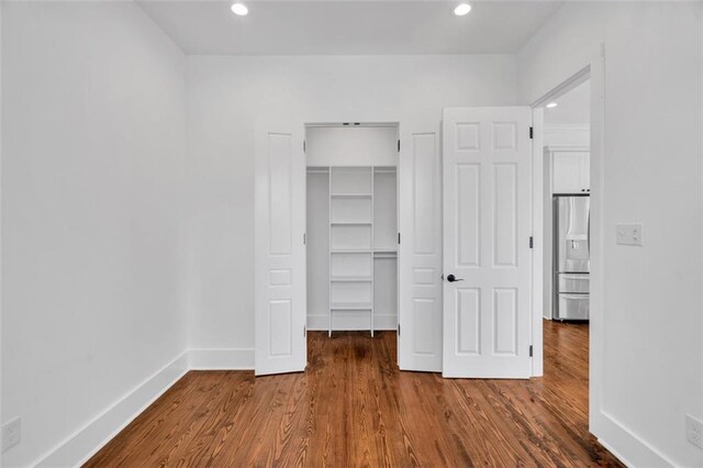 laundry room featuring cabinets, washer hookup, hookup for a gas dryer, sink, and light tile flooring