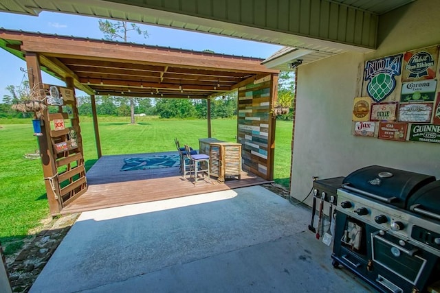 view of patio / terrace with a grill and a wooden deck