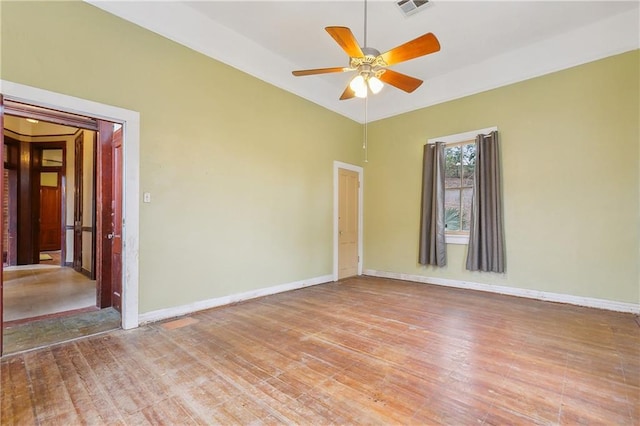 unfurnished room featuring ceiling fan and hardwood / wood-style floors