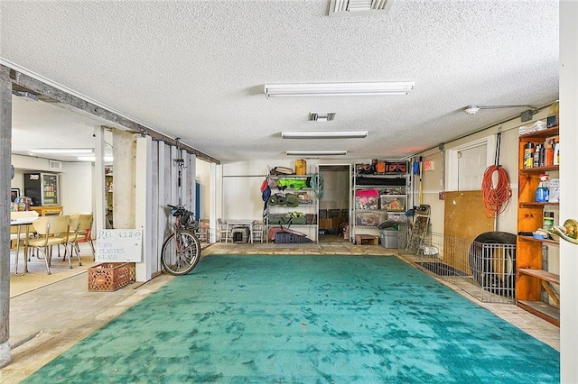 interior space featuring a textured ceiling