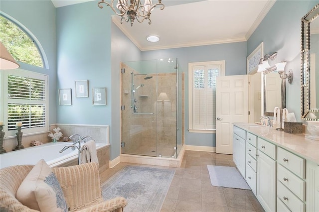 bathroom featuring vanity, plus walk in shower, an inviting chandelier, tile patterned flooring, and plenty of natural light