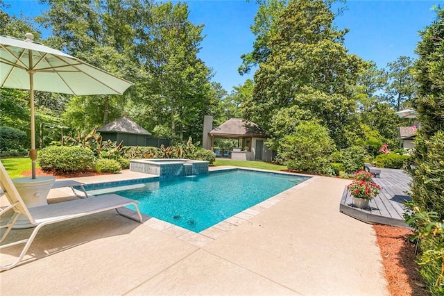 view of pool featuring a gazebo, a diving board, an in ground hot tub, and a wooden deck