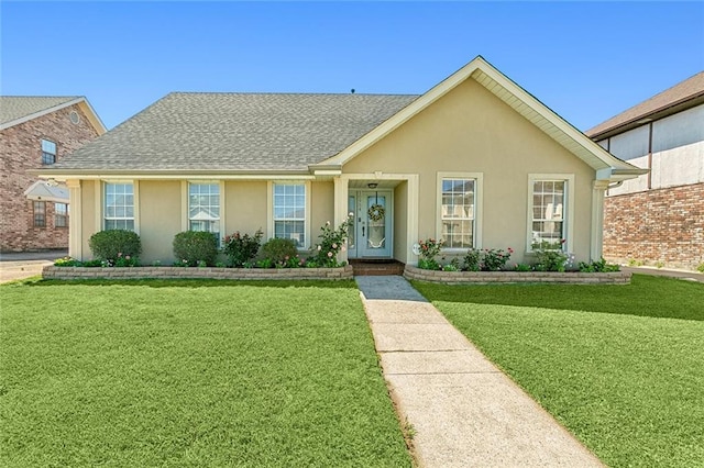 ranch-style home featuring a front lawn