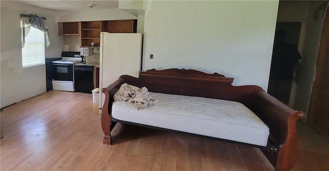 bedroom featuring light hardwood / wood-style flooring