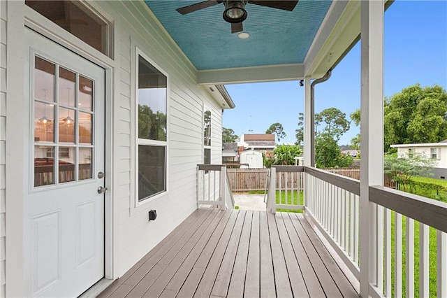 wooden terrace with ceiling fan