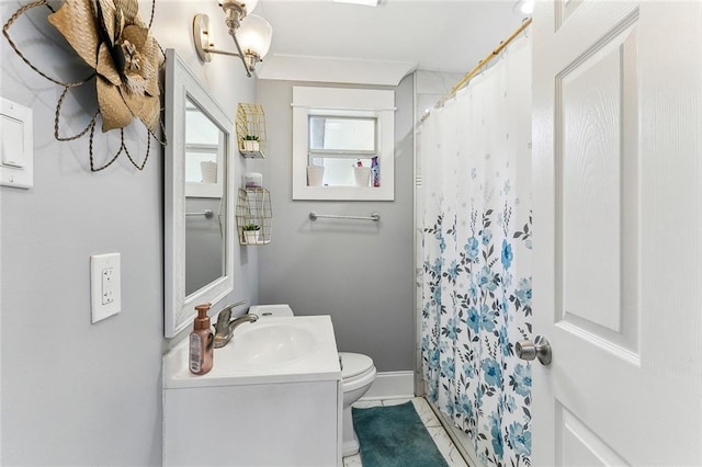 bathroom with a shower with curtain, vanity, and toilet