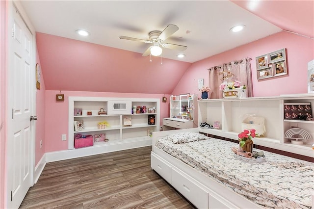 bedroom featuring ceiling fan, wood-type flooring, and vaulted ceiling