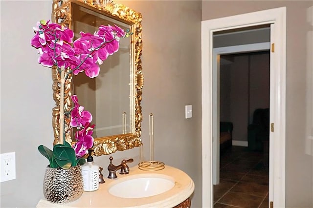 bathroom with tile patterned floors and vanity