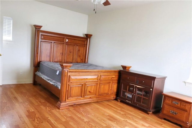 bedroom featuring ceiling fan and light hardwood / wood-style flooring