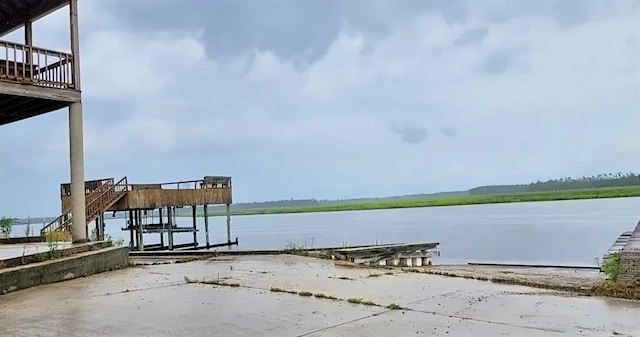 view of dock with a water view