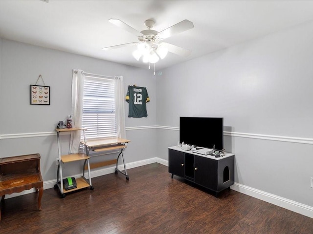 miscellaneous room featuring ceiling fan and dark wood-type flooring