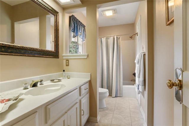 full bathroom featuring vanity, tile patterned flooring, toilet, and shower / bathtub combination with curtain