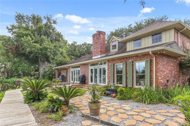 back of property with a patio area