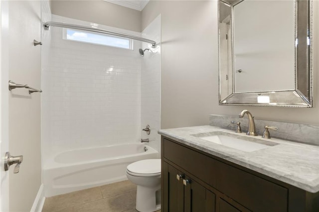 full bathroom with tile patterned flooring, vanity, toilet, and tiled shower / bath