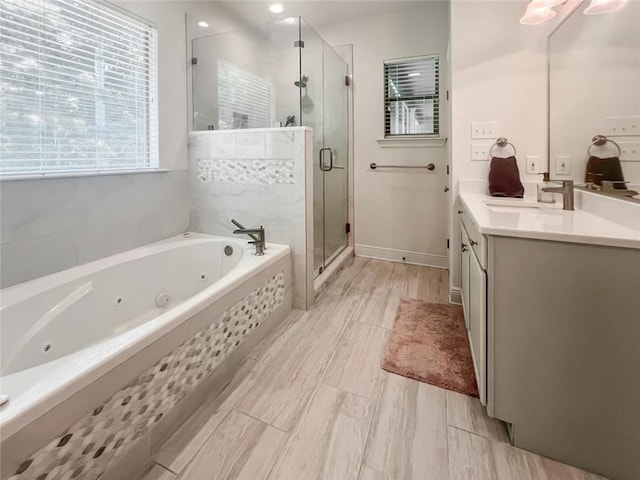 bathroom featuring vanity and plus walk in shower