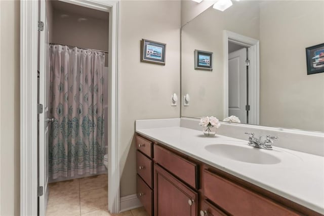 bathroom with tile patterned floors, vanity, toilet, and a shower with shower curtain