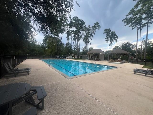 view of pool with a gazebo and a patio